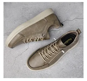 Top-down view of vintage men's olive brown casual leather sneakers with beige sole