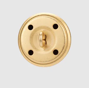 Detailed back view of high-end golden brass clothing button with sewing shank.