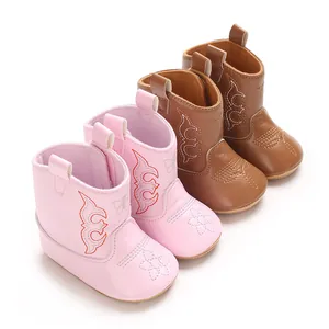 Adorable pink and brown baby cowboy boots with soft PU leather and floral embroidery details