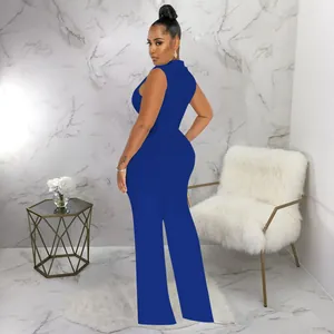 Detailed back view of a sleeveless high-neck royal blue wide-leg jumpsuit on a model