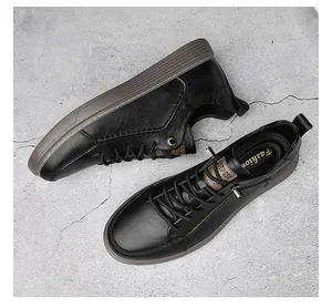 Close-up detail of men's black leather vintage casual work shoes on concrete floor