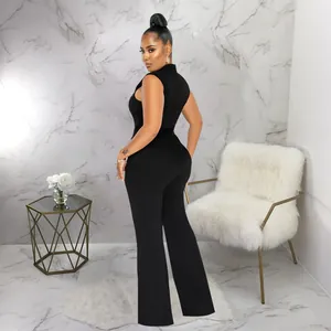 Back view of a sleek black sleeveless jumpsuit with high neck and wide leg pants