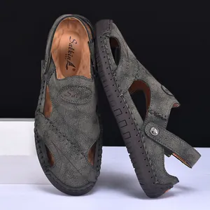 Detailed view of breathable grey leather men's outdoor casual sandals for summer