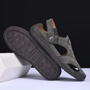 Detailed view of durable men's casual cowhide sandals with non-slip rubber sole.