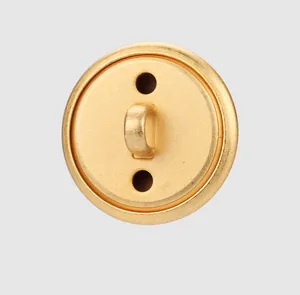 Back view detail of a premium brass metal shank button for high-end clothing accessories