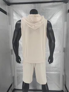 Back view of men's beige sleeveless gym hoodie vest and matching shorts set
