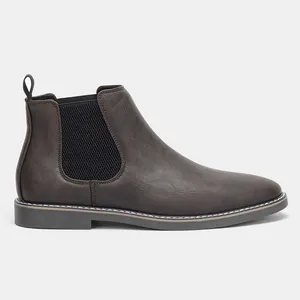 Vue latérale détaillée des bottines Chelsea marron foncé pour homme en similicuir