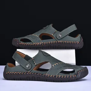 Detailed side view of men's dark green leather outdoor casual sandals with stitching