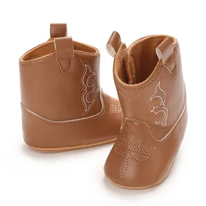 Adorable brown baby cowboy boots with intricate white embroidery and soft PU leather