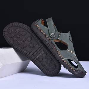 Detailed view of men's leather outdoor sandals showing side design and non-slip sole