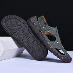 Detailed view of men's leather outdoor sandals highlighting the anti-slip rubber outsole
