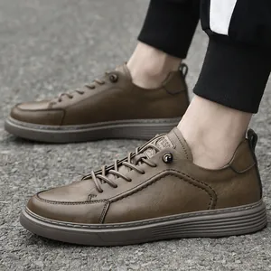 Vintage men's brown leather low-top sneakers with no-tie laces for casual urban wear