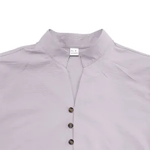 Detail of men's lavender stand collar shirt featuring V-neck and three buttons