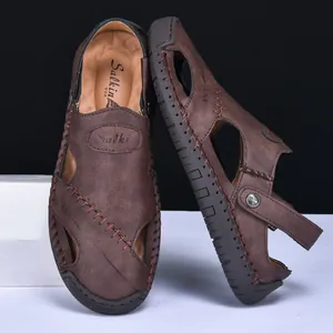 Detail showing premium brown cowhide leather and stitched construction of men's sandals