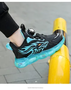 Chaussures de sport pour garçons noir et cyan avec fermeture à boucle rotative