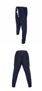 Detailed view of navy blue jacquard joggers with drawstring waist and ribbed cuffs