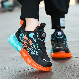 Zwarte sportschoenen voor jongens met draaisluiting en vlammenpatroon, 5-12 jaar