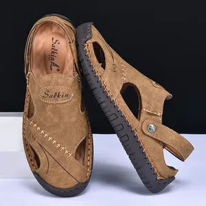 Durable brown leather outdoor sandals for men with breathable cut-outs and heel strap