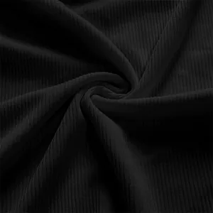 High-quality detailed macro view of premium black ribbed fabric for men's base layer tank top