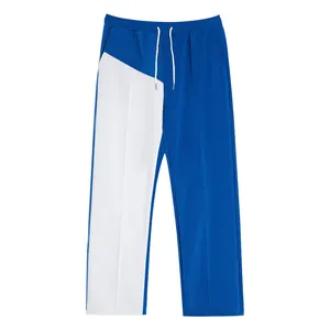 Detailed view of blue and white color-block men's straight-leg oversized casual pants