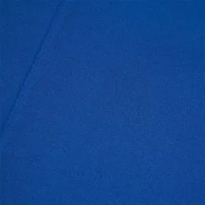 Close-up macro view showing the fine texture and high-quality blue fabric of men's pants