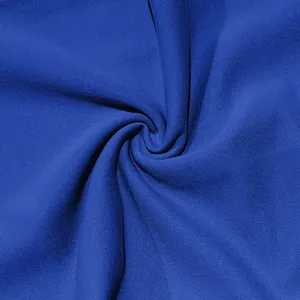 Macro view of high-quality bright blue breathable fabric texture for men's trousers