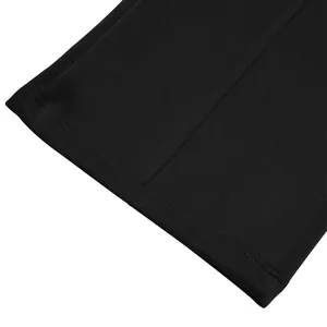 Close-up of the hem and stitching detail on black men's casual pants