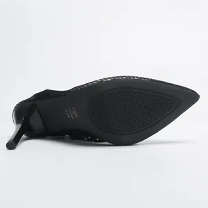 Detail of black mesh stiletto sandal sole with non-slip texture and size 23.5