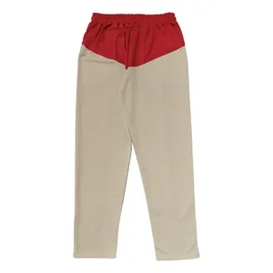 Detail view of two-tone red and beige oversized straight leg men's casual pants for spring