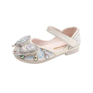 Elegant cream girls princess shoes with rhinestones and iridescent butterfly bow