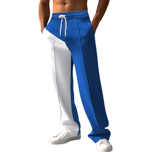Close-up detail of men's blue and white color-block oversized casual straight-leg pants