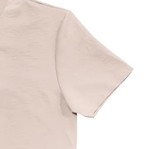 Macro detail of short sleeve on men's retro linen shirt showing high quality fabric texture