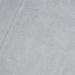 Macro detail view of high quality light gray fabric and seam for men's casual oversize pants
