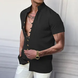 Detail of black men's retro linen shirt with stand collar and decorative buttons.