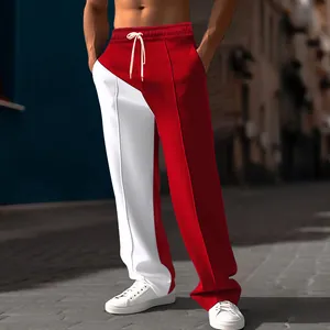 Detailed view of men's red and white color-block straight-leg oversized casual pants