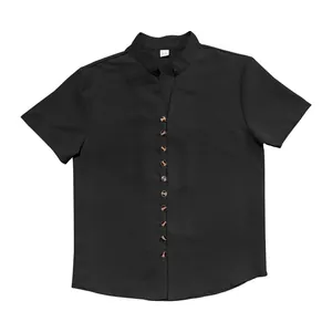 Detailed texture view of men's black retro linen shirt featuring stand collar and buttons
