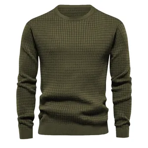 Men's olive green long sleeve crew neck sweater with textured waffle knit pattern.