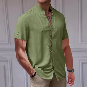 Macro detail of men's vintage olive green linen shirt with mandarin collar and buttons
