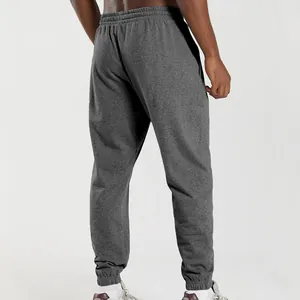 Detailed rear view of grey men's sports joggers with elastic waist and tapered cuffs