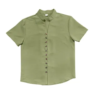 Detailed front view of men's olive green linen shirt with stand collar and buttons
