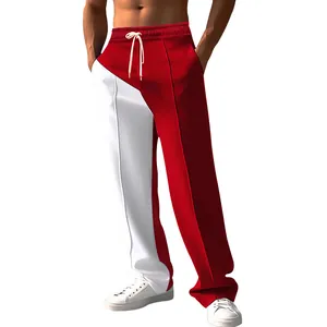 Detail of red and white color-block oversized men's wide-leg trousers with drawstring