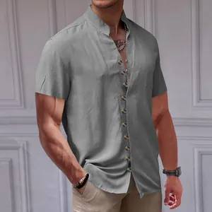 Detail view of men's grey linen short sleeve shirt with stand collar and buttons