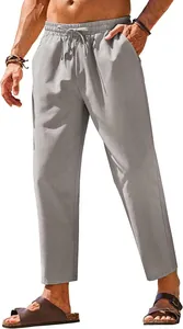 Detail view of men's light grey linen casual pants with drawstring waist and straight fit.