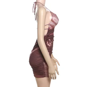 Detailed side view of a brown gradient halter backless ruched satin bodycon mini dress.