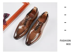 Detail view of premium brown leather Oxford shoes with polished finish and wooden shoe trees