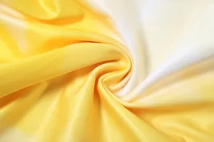 Close-up macro shot of yellow and white gradient fabric texture for summer bodycon dress