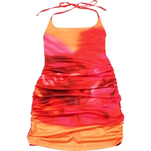 Close-up detail of sunset gradient pleated halter dress with elegant neck tie back