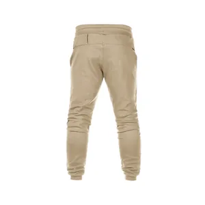 Vista posterior de pantalones deportivos beige para hombre con cintura elástica y puños