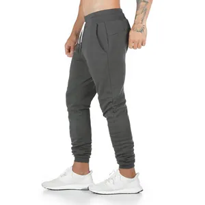 Pantalones de chándal gris oscuro para hombre para fitness y entrenamiento atlético