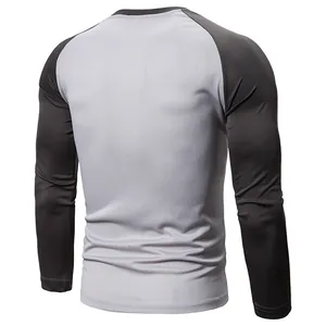 Men's raglan long-sleeve t-shirt back view with grey and dark grey color-blocking.